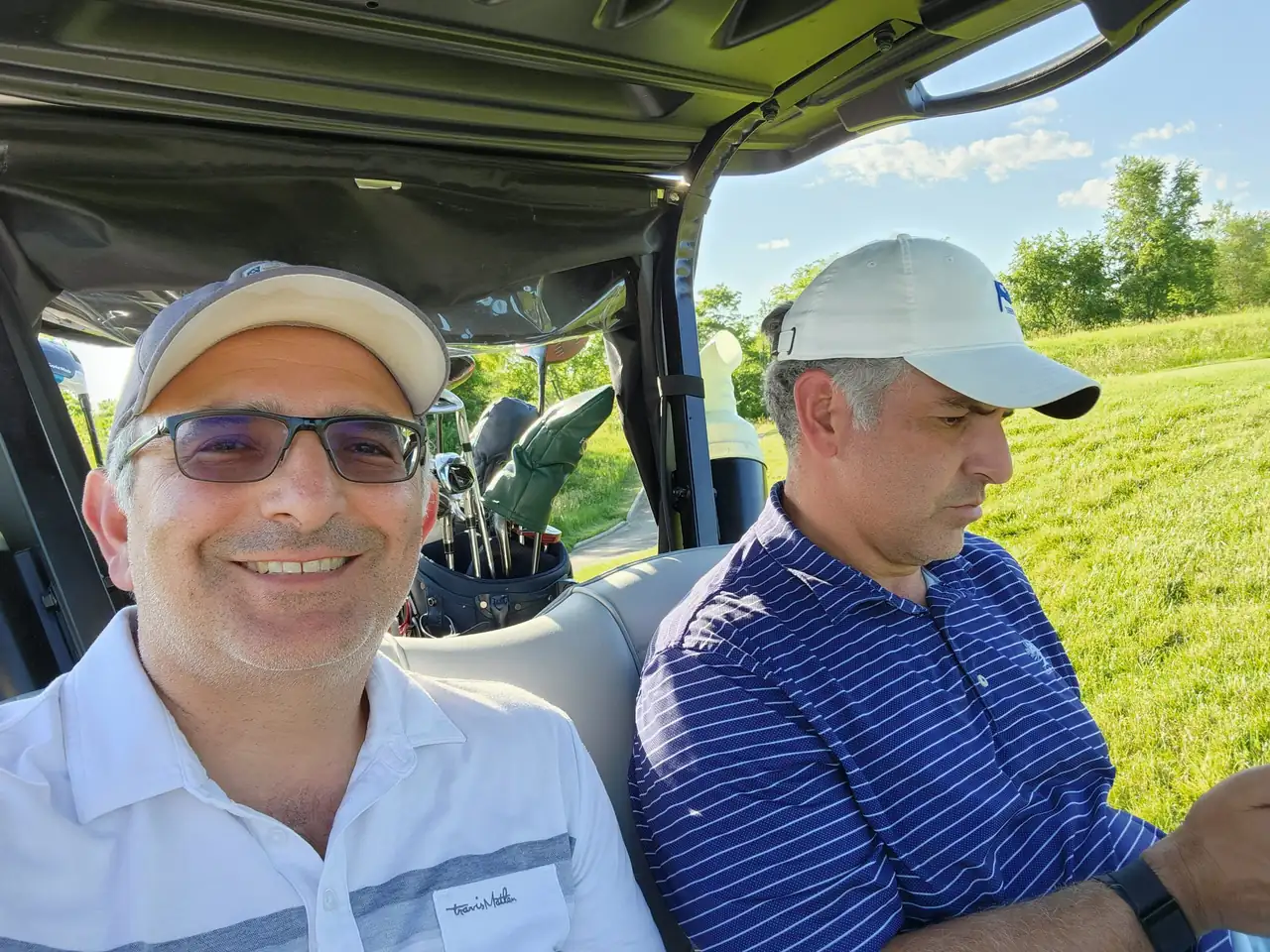 The Perry Bros in the cart on the second round at Victoria National