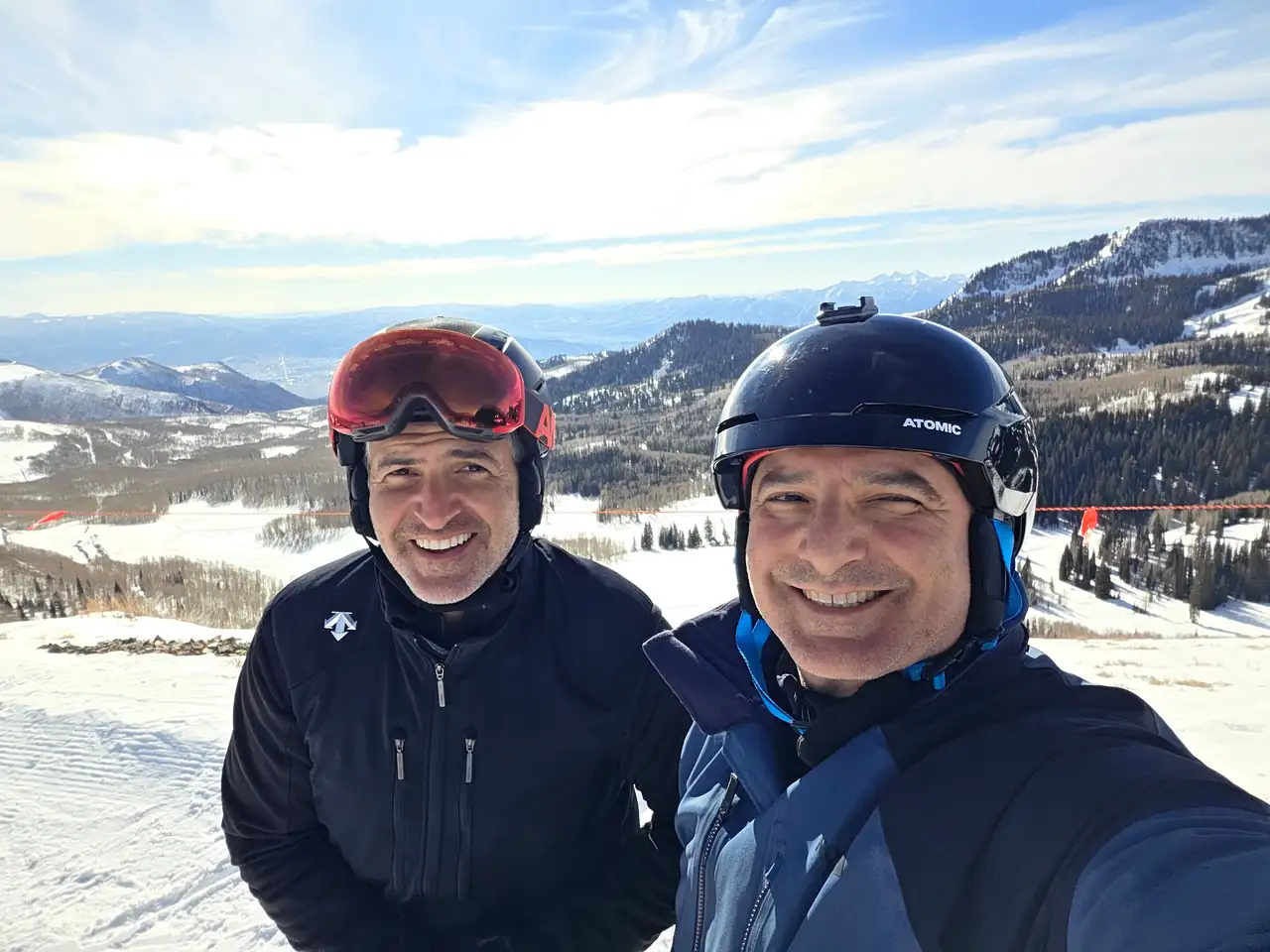 The Perry Bros on the mountain in Park City with the Wasatch peaks behind them